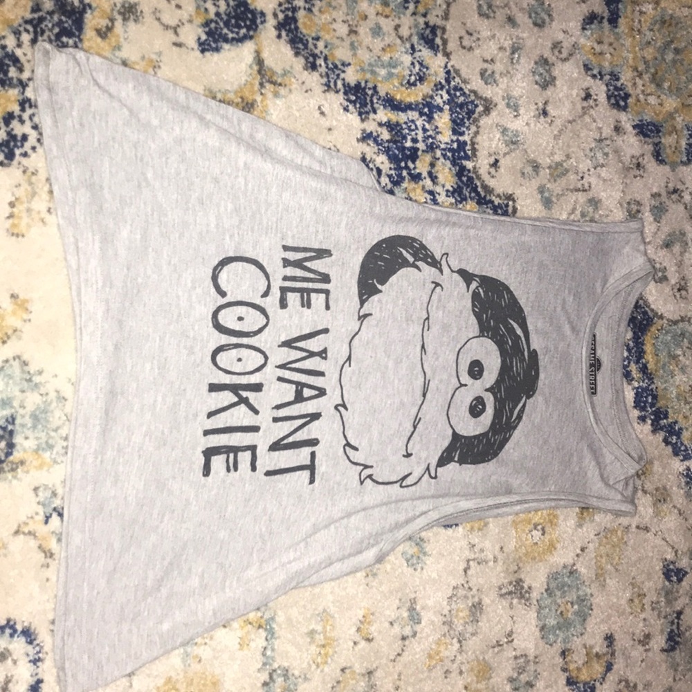 A super cute muscle T featuring: Cookie Monster
